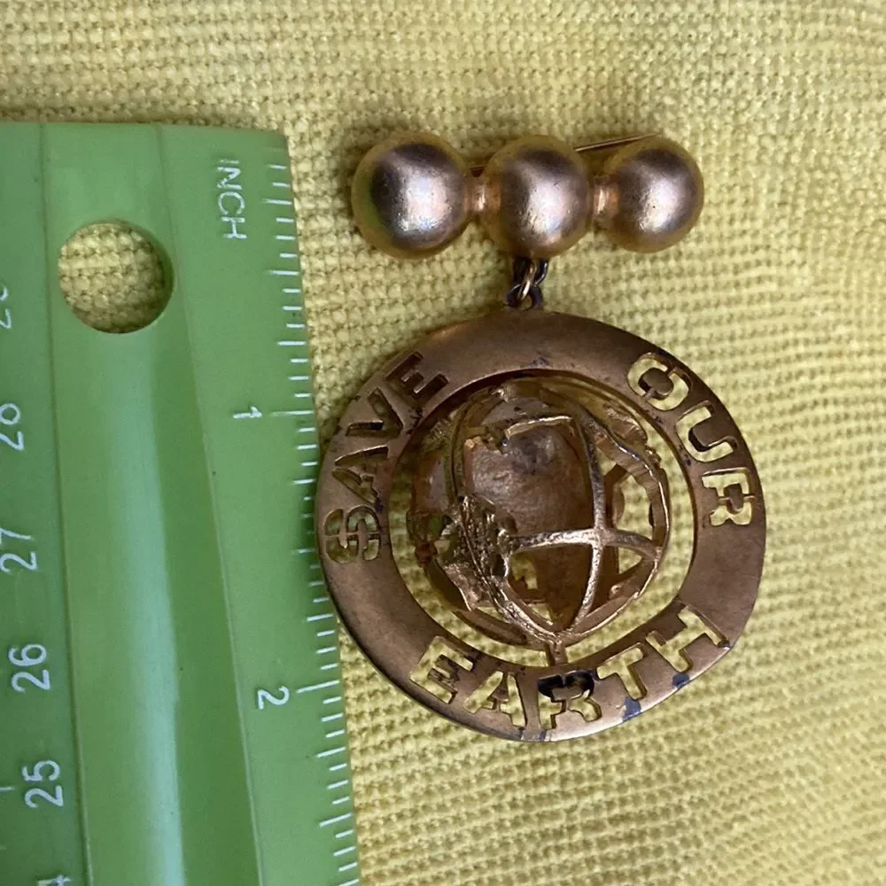 D torem renclif save our world vintage brooch